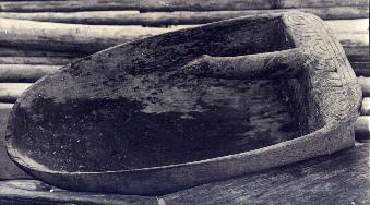 [Scoop-shaped Trobriand canoe bailer carved of wood with simple birdhead handle: 16k]